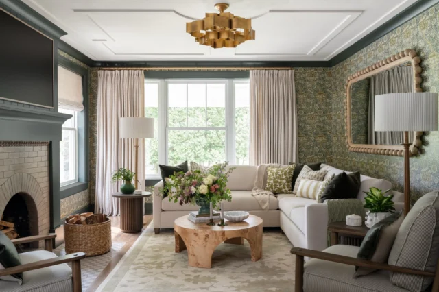 INTRODUCING // The Living Room at #ProjectDutchColonialDelight. ✨

Our team gave this living room a full glow up, beginning with a beautifully updated fireplace surround and hearth, richly refinished wood floors, and a reworked ceiling that adds just the right amount of subtle architectural interest overhead.

We layered in a moody wallpaper, custom linen window treatments, and plenty of texture to create a space that feels both warm and inviting. By thoughtfully reimagining the layout, we established a more natural flow that supports everyday living, while making entertaining feel effortless.

The result? A layered, elevated living room that honors the home’s classic roots while embracing a fresh perspective.

Swipe all the way through to the end to see where we started, what we kept and how every detail came together to transform this space. Can you guess what we kept? ✨

➡️ Dreaming up a custom new build or large scale renovation? We’d love to shape it with you!

➡️ We aren’t limited by location: we’ve completed design projects in Florida, New York, Connecticut, Delaware, Pennsylvania and beyond, and welcome your out-of-state inquiry!

➡️ Don’t live locally but have - or are dreaming of - a home here in Hamilton, NY? No problem! Distance is not a barrier. Our team can work with you remotely to design, manage, and bring your vision to life.

➡️ Feeling like your existing home doesn’t reflect how you live or come together cohesively and with intention? Our full-home furnishing & accessorizing services will bring everything into alignment and create a home you love to live in!

➡️ Email Erika with a brief description of your project via the link in our profile and let’s create something extraordinary together. ✨

Design + Details // @swankbydesign 
Builder // @brianendersconstruction 
Architect // @hkk_architects 
Plants // @theplantstandcny 
Florals // @brownbuiltrentals 
Sectional // @route20sofacompany 
Project // Dutch Colonial Delight

#LivingRoomDesign #InteriorDesign #BeforeAndAfter #TimelessInteriors